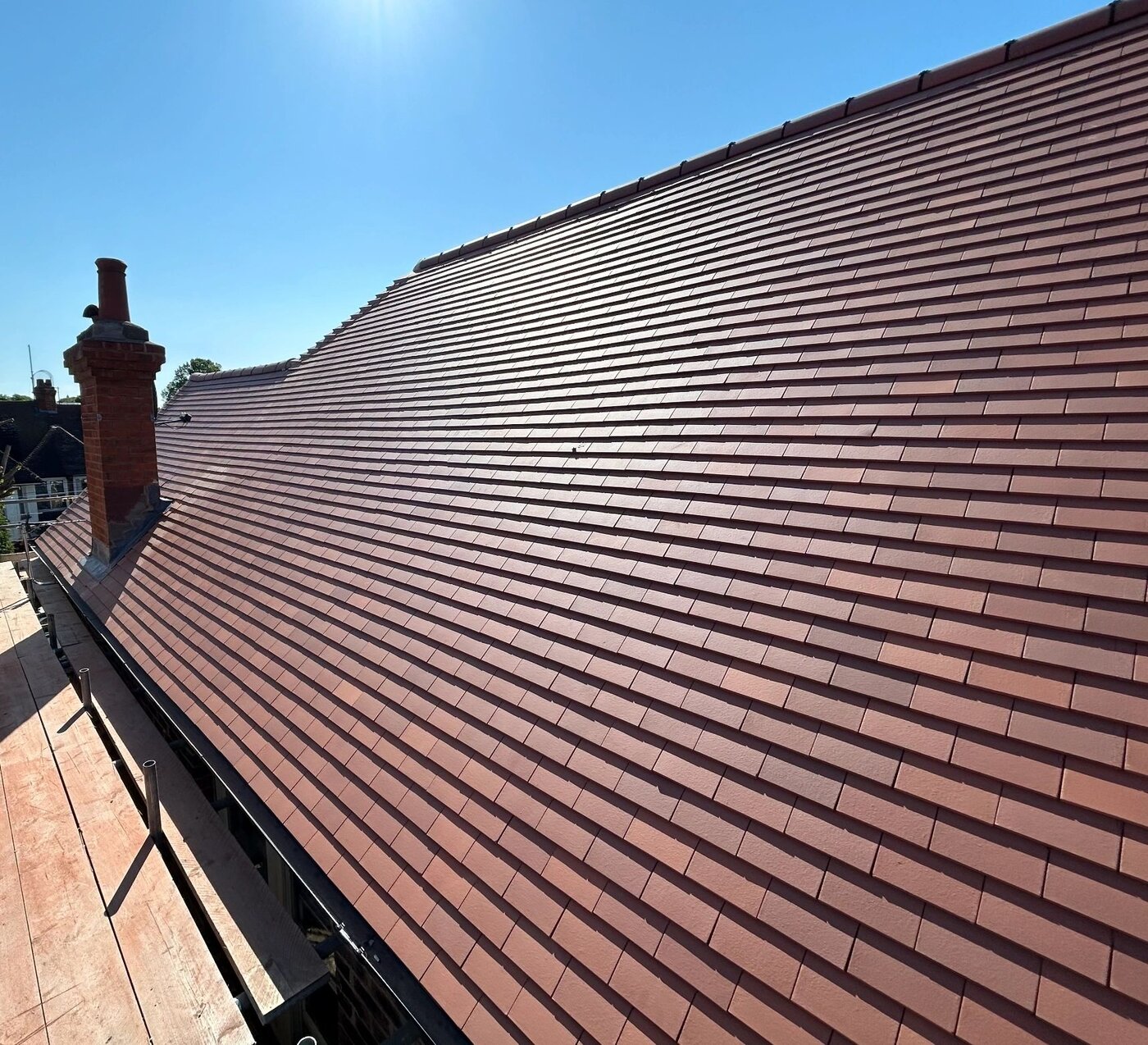 New plain clay tile re-roof by Nathan & Co in Eastbourne